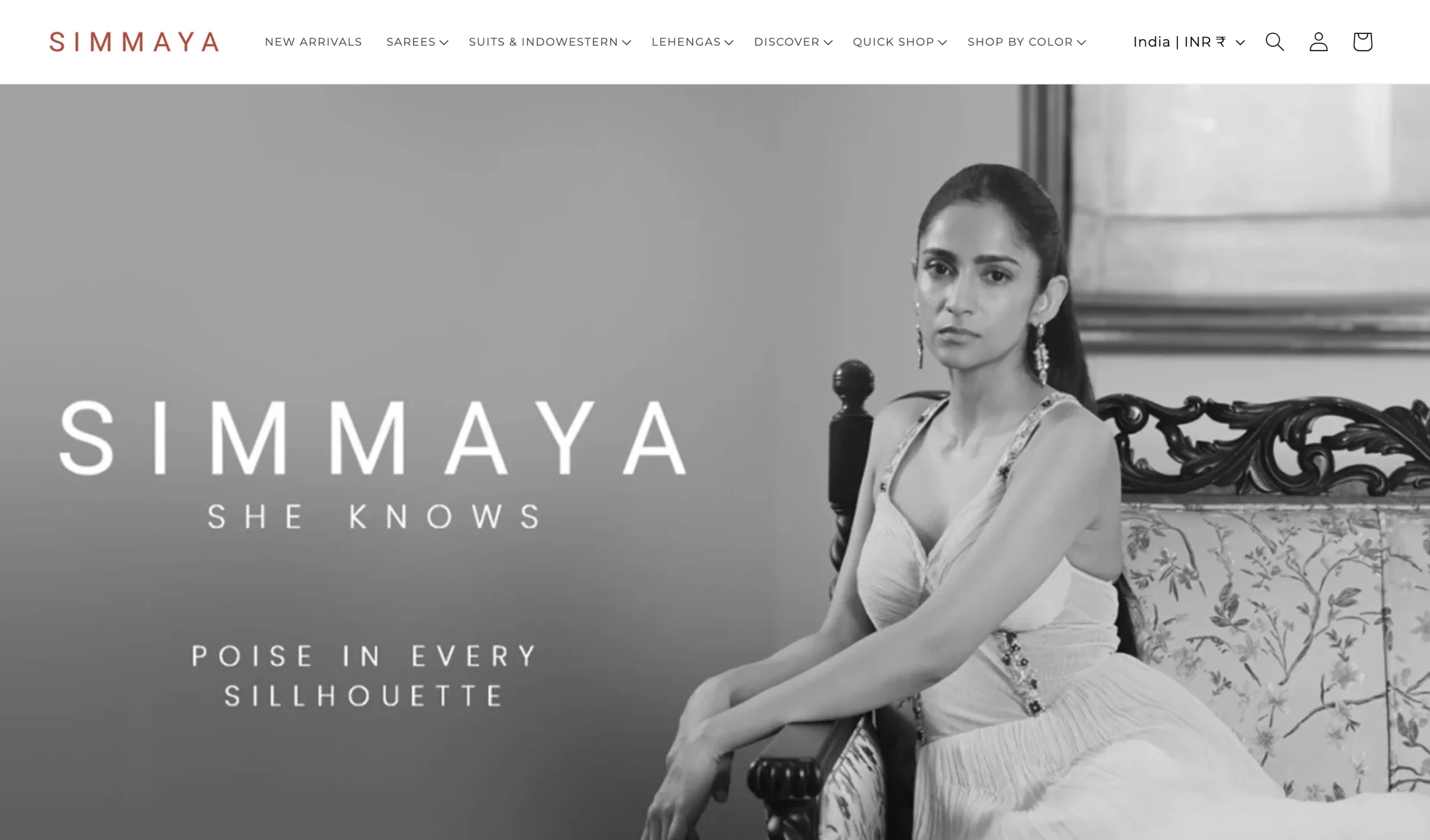 Simmaya homepage on desktop: the menu for new arrivals, sarees, suits and Indo-Western, lehengas, Discover, Quick Shop and Shop by Colour, the India | INR selector, and a campaign portrait under the wordmark 'Simmaya, she knows'